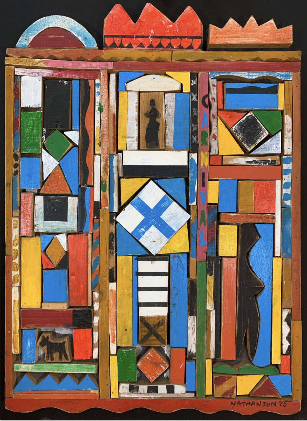 Carnival (2015) — a brightly painted three-panel wood assemblage by Morris Nathanson